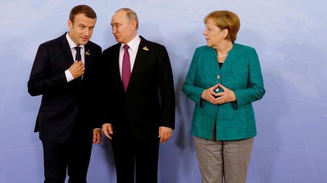 Путин провел переговоры с Меркель и Макроном