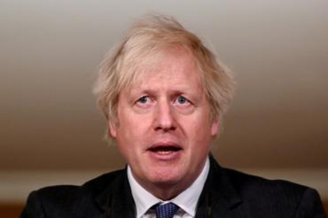 UK PM Johnson says must keep up restrictions to lower COVID rates further