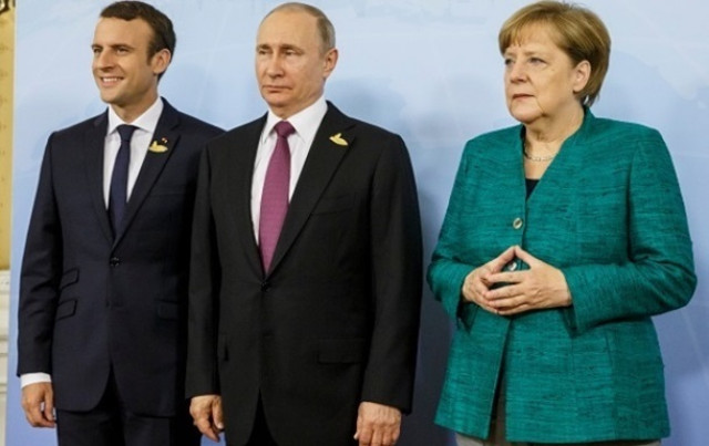 Меркель, Макрон и Путин обсудили вопрос Донбасса